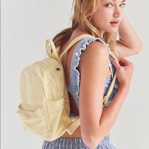 Urban Outfitters yellow canvas mini backpack
